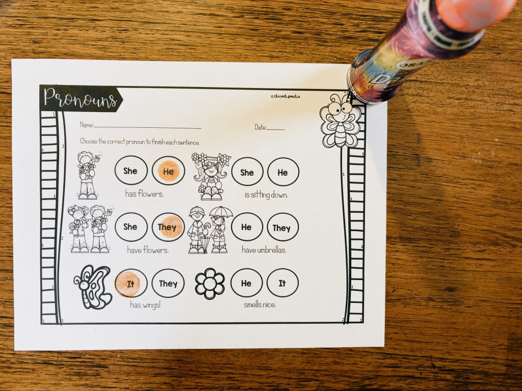 This picture shows a spring grammar worksheet for kindergarten that targets subjective pronouns. For speech therapy and education